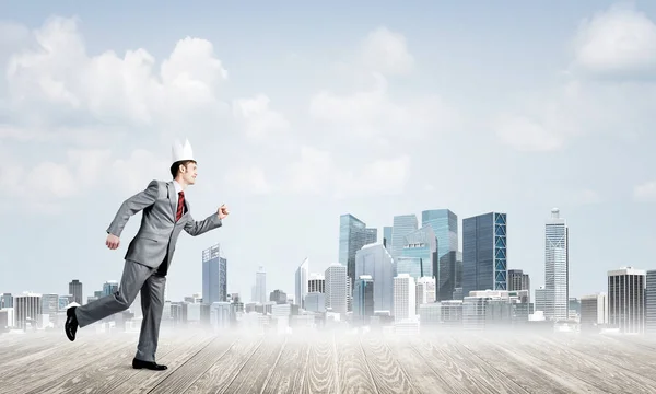 Young Handsome Businessman Wearing White Paper Crown Running Hurry Cityscape — Stock Photo, Image