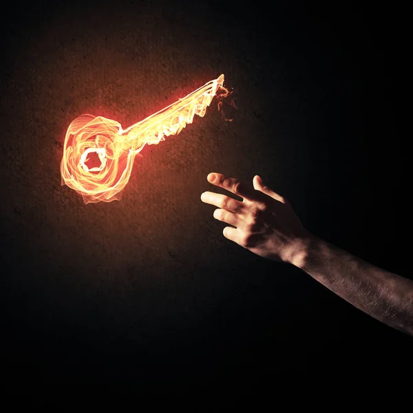 Feuer glühendes Schlüsselsymbol — Stockfoto