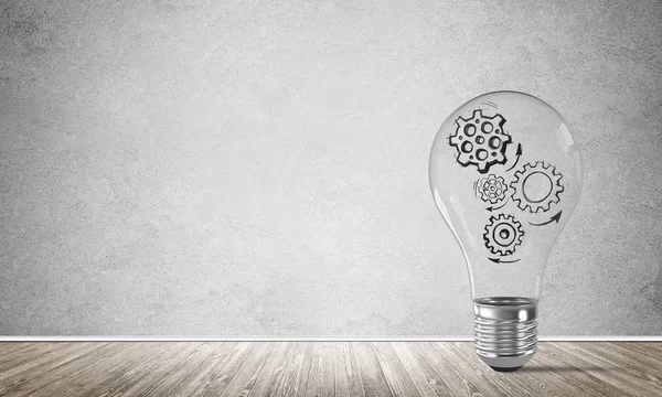 Glass Lightbulb Sketched Multiple Gears Placed Empty Room Grey Wall — Stock Photo, Image