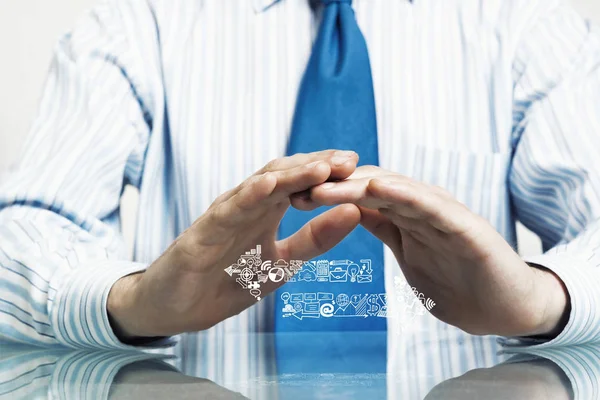 Empresario Traje Sentado Escritorio Haciendo Gesto Protector Con Palmas — Foto de Stock