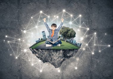 kitap üzerinde yüzen ada, bağlantı kavramı oturan çocukla mutlu çocuk