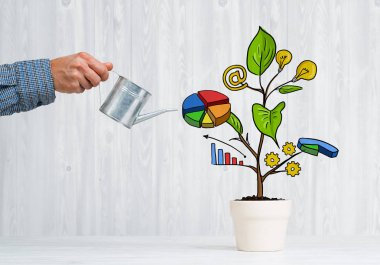 İş planı ve strateji kavramı sulama adamın elini