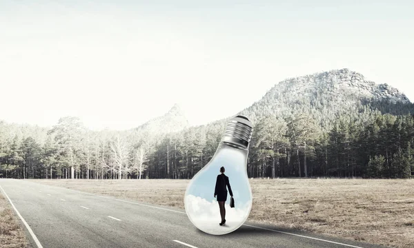 Empresária dentro da lâmpada — Fotografia de Stock