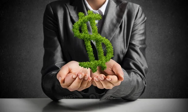 Businessman Black Suit Presenting Green Plant Form Dollar Symbol Hands — Stock Photo, Image