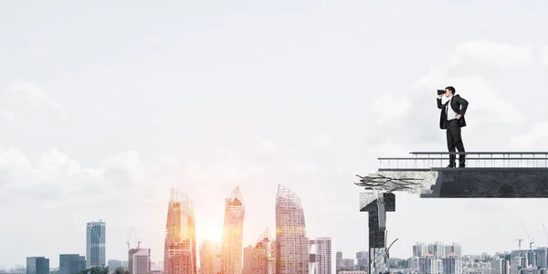 Businessman Suit Looking Binoculars While Standing Broken Bridge Cityscape Sunlight — Stock Photo, Image