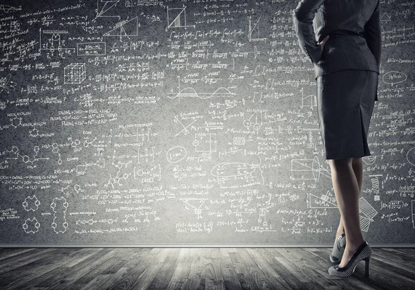 Bottom View Businesswoman Standing Sketches Blackboard — Stock Photo, Image