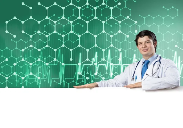 Medico con banner bianco in mano — Foto Stock