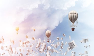 Renkli aerostats kağıt belgeler arasında ve mavi bulutlu gökyüzü üzerinde uçan. 3D render.
