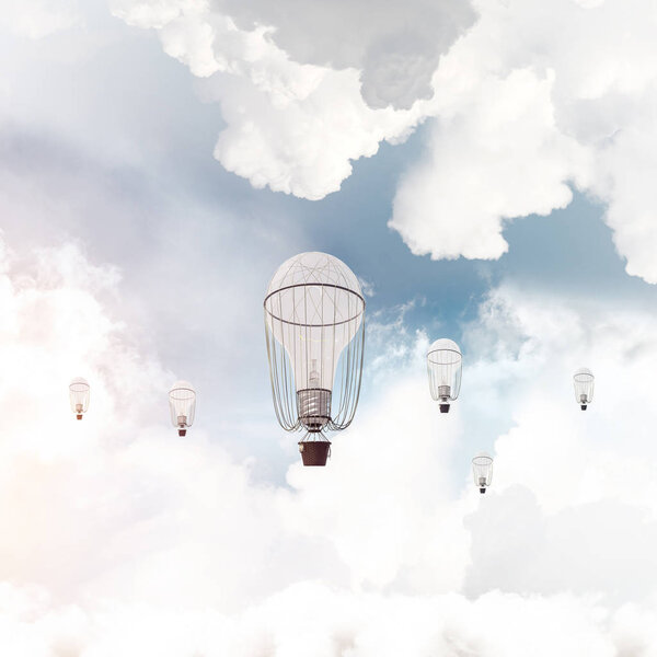 Colorful aerostats flying over the blue cloudy sky. 3D rendering.