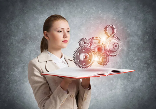 Woman Showing Abstract Mechanism Cogwheels Open Book Construction Manufacturing Mechanical — Stock Photo, Image