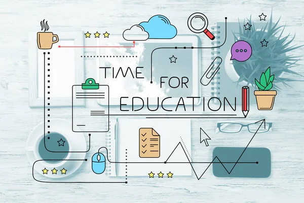 Top view of coloured sketched educational concept above modern workplace with office stuff on background. Mixed media.