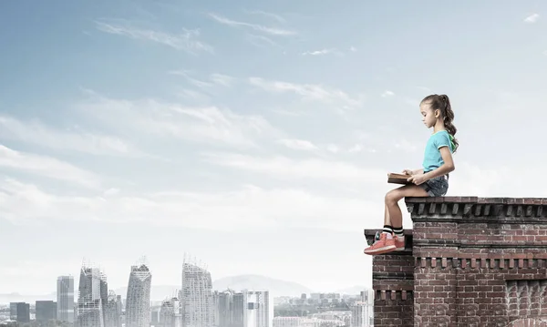 Cute Kid Girl Sitting Building Roof Reading Book — Stock Photo, Image