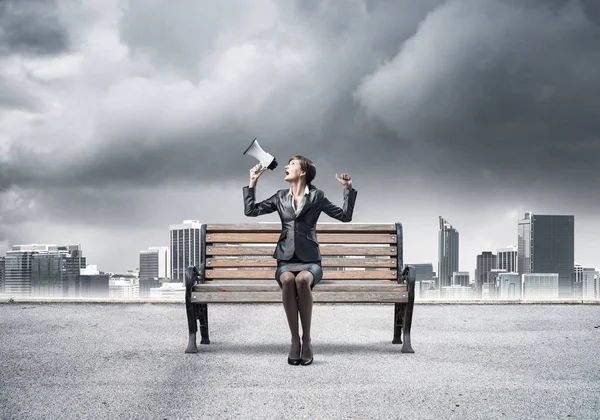 Business Woman Megaphone Sitting Wooden Bench Female Speaker Shouting Loudspeaker — Stock Photo, Image