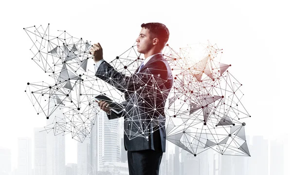 Business person pointing on abstract network
