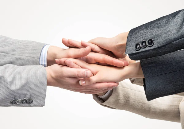 Concept of teamwork and unity with palms one on one in pile — Stock Photo, Image