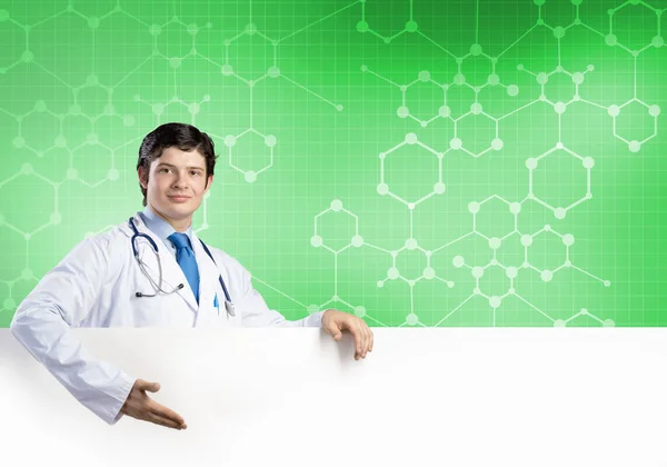 Young Handsome Doctor Holding White Blank Banner Place Your Text — Stock Photo, Image