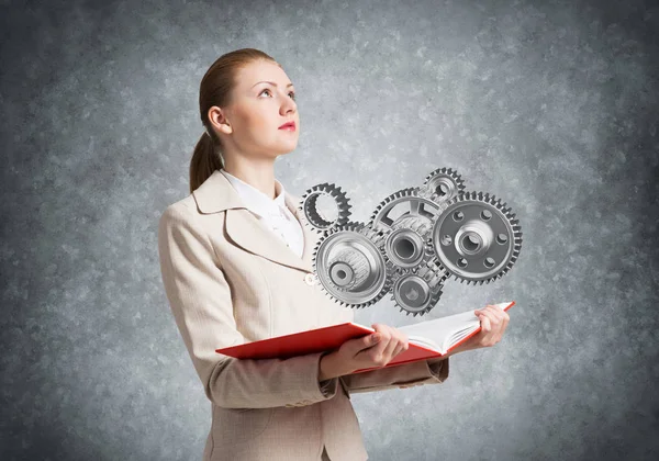 Woman Showing Abstract Mechanism Cogwheels Open Book Construction Manufacturing Mechanical — Stock Photo, Image