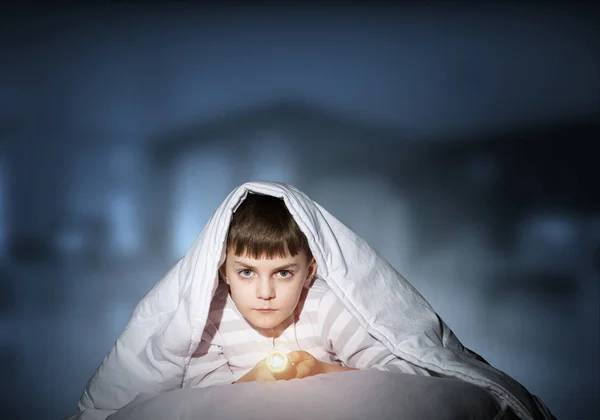 Serious Child Flashlight Hiding Blanket Attentive Kid Lying His Bed — Stock Photo, Image