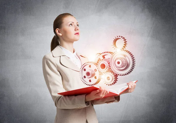 Woman Showing Abstract Mechanism Cogwheels Open Book Construction Manufacturing Mechanical — Stock Photo, Image