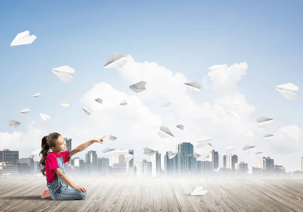 Cute Kid Girl Sitting Wooden Floor Paper Planes Flying — Stock Photo, Image