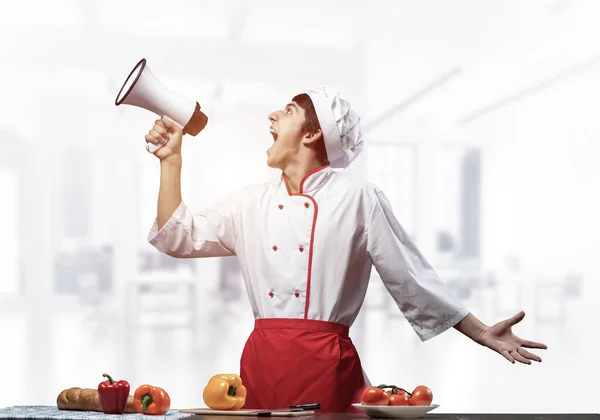 Young Chef Shouting Loudly Megaphone Emotional Caucasian Chef White Hat — Stock Photo, Image