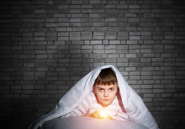 Serious Child Flashlight Hiding Blanket Attentive Kid Lying His Bed — Stock Photo, Image