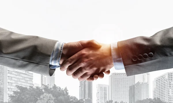 Close Business People Shaking Hands Symbol Partnership Mixed Media — Stock Photo, Image