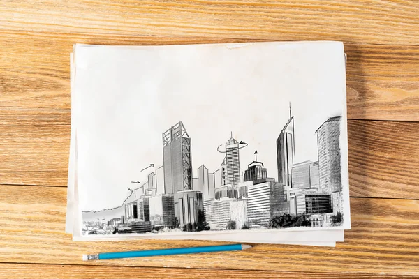 現代のメガポリススカイライン鉛筆画 高層ビルが林立する都市建築 質感の天然木の背景に紙のシート 創造的な街並み画 — ストック写真