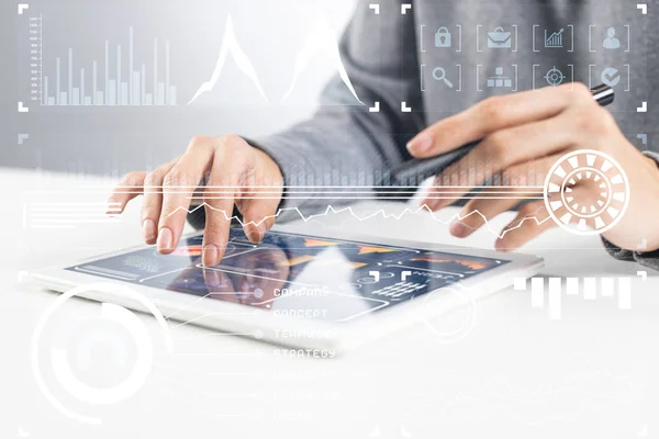 Businessman hands using tablet computer. Digital marketing media or financial diagrams in virtual screen. 3D chart floating above digital tablet computer screen. Modern smart technology in business