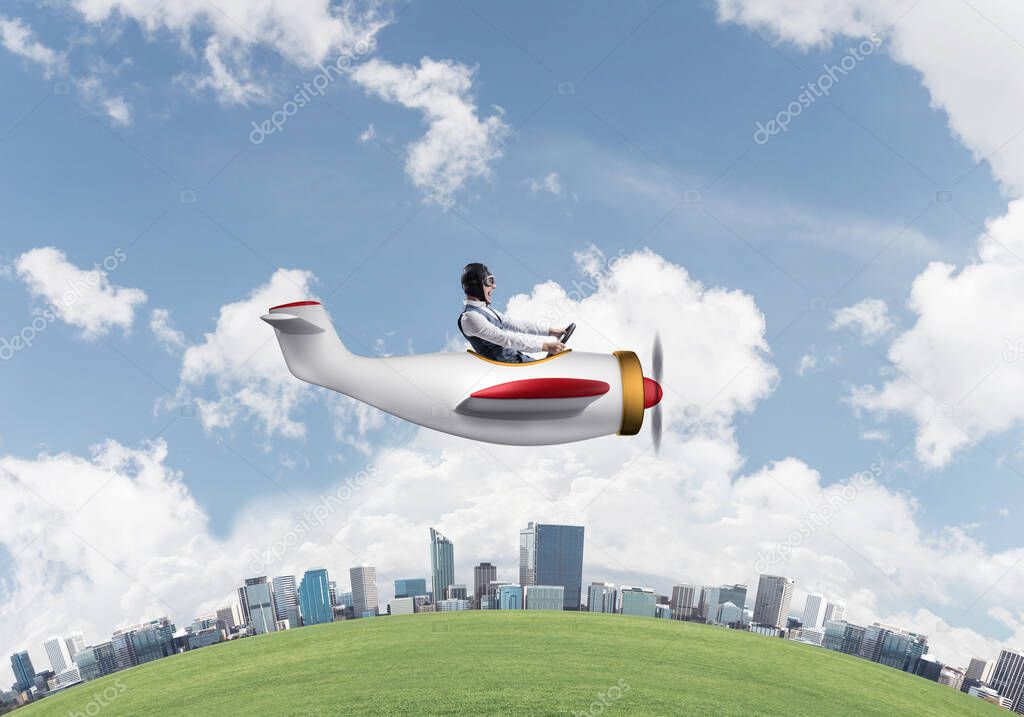 Aviator driving propeller plane above business center. Pilot in leather helmet sitting in airplane and holding steering wheel. Rounded of city skyline with high skyscrapers and office buildings.