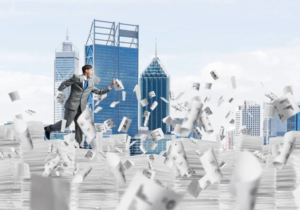 Businessman Black Suit Running Phone Hand Flying Paper Documents Cityscape — Stock Photo, Image