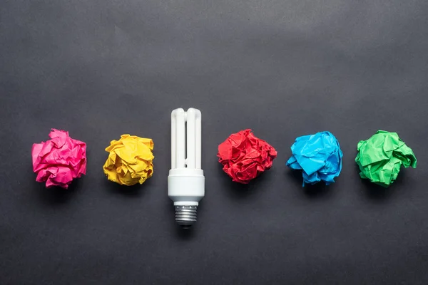 Fluorescent Lamp Crumpled Colorful Paper Balls Black Background Successful Solution — Stock Photo, Image