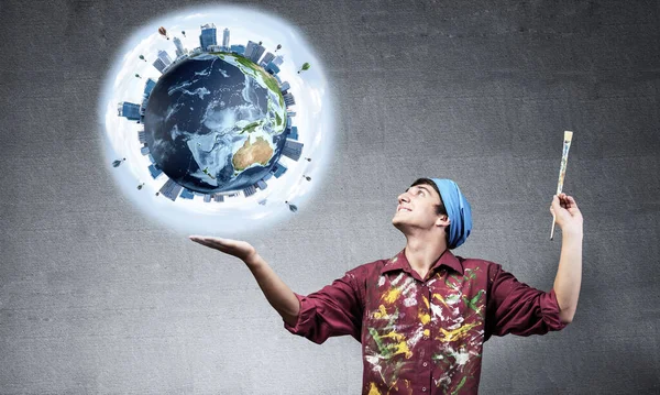 Young Artist Holding Earth Globe Hand Male Painter Dirty Shirt — Stock Photo, Image