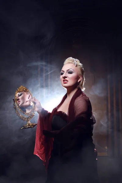 Scary Blonde Woman Creating Magic Golden Mirror — Stock Photo, Image
