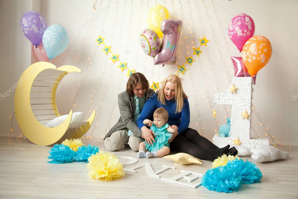 pretty young girl playing and having fun with parents