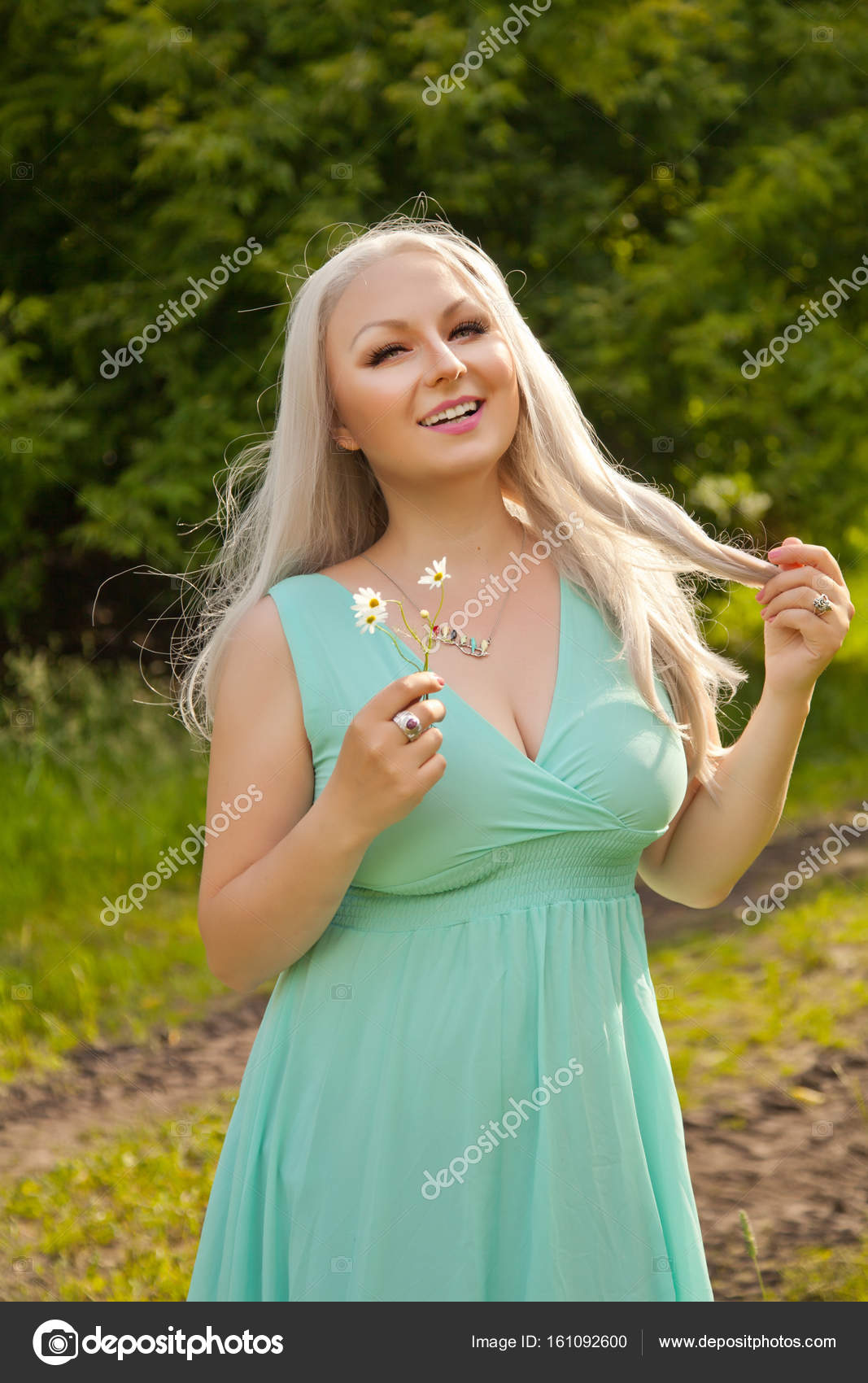 Pretty happy woman on nature Stock Photo ©agnadevi 161092600