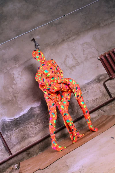 Two orange zentai fetish girl playing — Stock Photo, Image