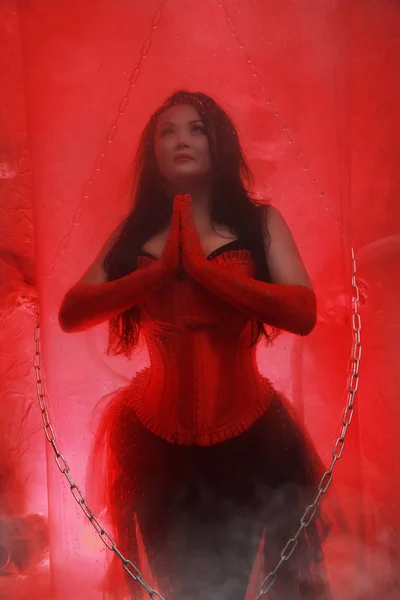 Beautiful plus size woman wearing red corset — Stock Photo, Image
