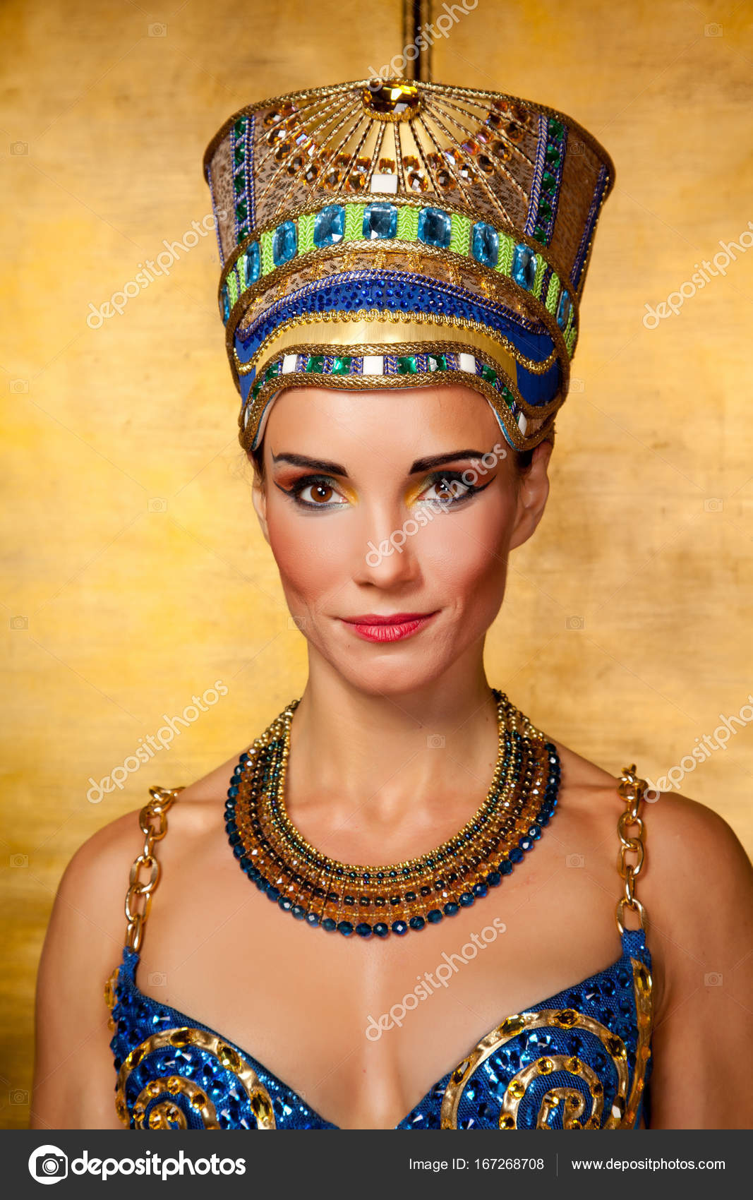 Sexual Beautiful Egypt Woman On The Huge Golden Gates Background Stock