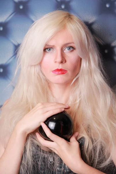 Young fortune teller working with her stone magic ball — Stock Photo, Image