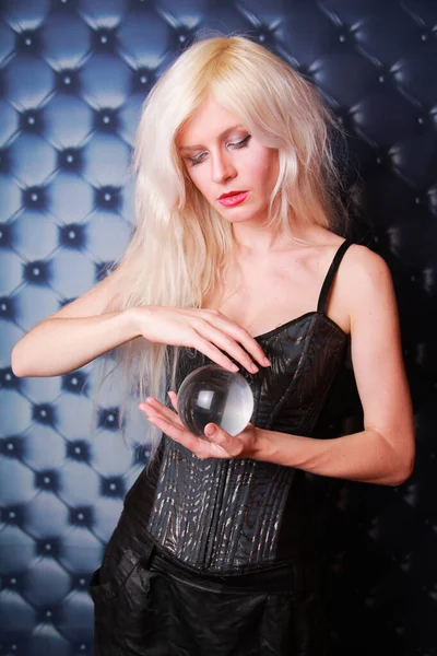 Young fortune teller working with her stone magic ball — Stock Photo, Image
