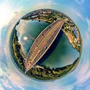 Beautiful futuristic panoramic (360 spherical panorama little planet) aerial drone view to city of Ust-Kamenogorsk (KZ: Oskemen), East Kazakhstan (Qazaqstan) clipart