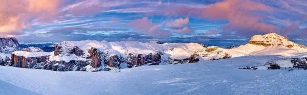 Beautiful panoramic view to the Sellaronda - the largest ski carousel in Europe - skiing the four most famous passes in the Dolomites, Italy; extraordinary snowy peaks of the dolomites, southern alps