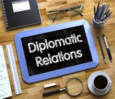 Small Chalkboard with Diplomatic Relations Concept. 3D. clipart