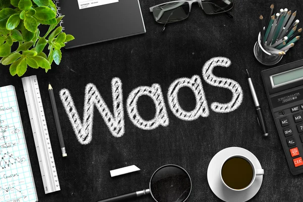 Waas - Text auf schwarzer Tafel. 3D-Darstellung. — Stockfoto