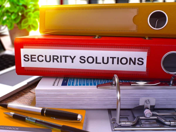 Sicherheitslösungen auf rotem Büroordner. getöntes Bild. 3d. — Stockfoto