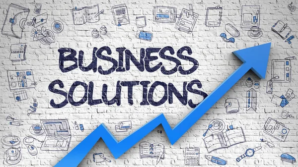 Soluzioni di business disegnate su mattone bianco . — Foto Stock