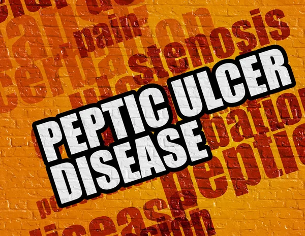 Gezondheidszorg concept: Peptic Ulcer ziekte op de gele baksteen-Wal — Stockfoto