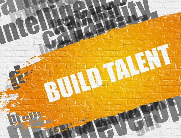 Build Talent on the White Brick Wall.