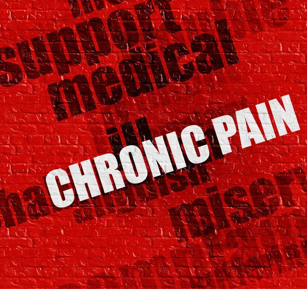 Modern medicin koncept: kronisk smärta på röda Brickwall . — Stockfoto